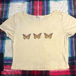 semi cropped yellow shirt